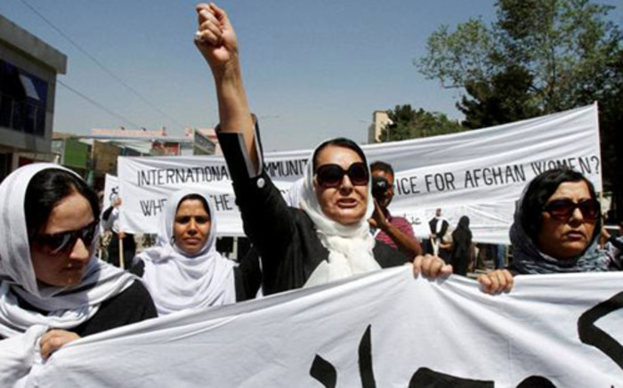 Women in Afghanistan protest for women's rights following the execution of a woman charged with adultery. Picture: AFP