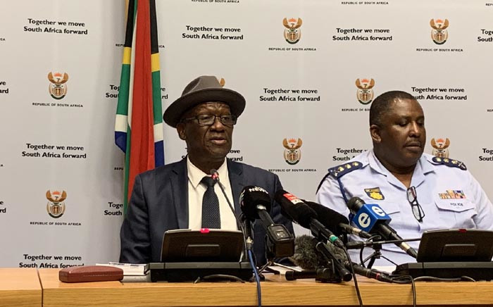 FILE: Police Minister Bheki Cele and the SA Police Service management brief the media. Picture: @SAgovnews/Twitter