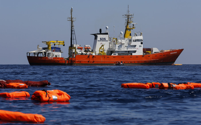 FILE: A picture taken on 23 June 2018 shows the 'Aquarius' rescue vessel, chartered by French NGO SOS-Mediterranee and Doctors Without Borders (MSF), during a rescue drill at open sea between Lampedusa and Tunisia. Picture: AFP