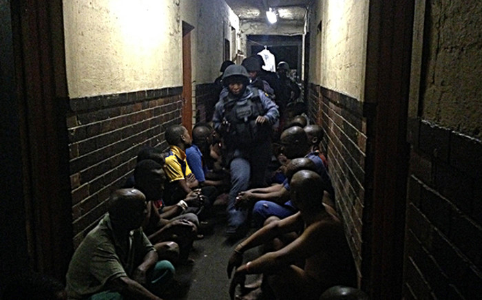 Police made several arrests during an overnight raid at a Jeppestown hostel in Johannesburg. Picture: Alex Eliseev/EWN