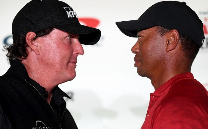 (L-R) Phil Mickelson and Tiger Woods face-off during a press conference before the match at Shadow Creek Golf Course on 20 November 2018 in Las Vegas, Nevada. Picture: AFP
