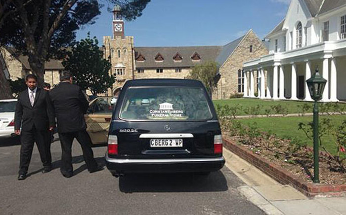James Thomas’s coffin arrives at the Chapel of Bishops College on 2 October 2013. Picture: Carmel Loggenberg/EWN
