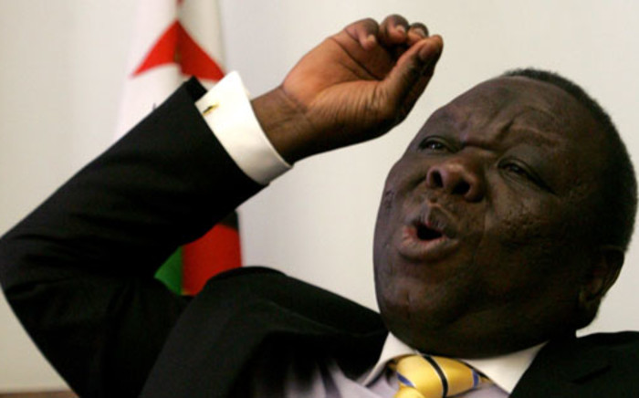 FILE: Zimbabwe Prime Minister and MDC leader Morgan Tsvangirai pictured on March 15, 2013 talking to church leaders about upcoming elections. Picture: AFP/JEKESAI NJIKIZANA
