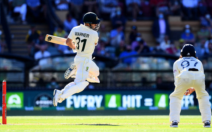 Australia's batsman David Warner ducks away from a bouncer on the day one of the second cricket Test match of the Ashes series between Australia and England in Adelaide on 16 December 2021. Picture: William West/AFP