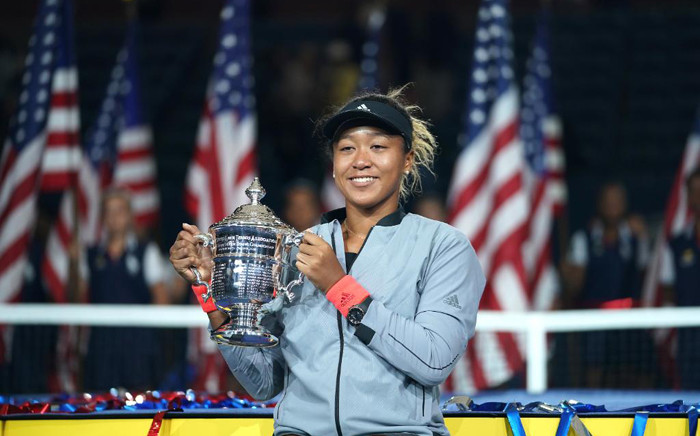 Naomi Osaka holding her trophy after winning the women's singles finals tennis match at the 2018 US Open. Picture: @usopen/Twitter
