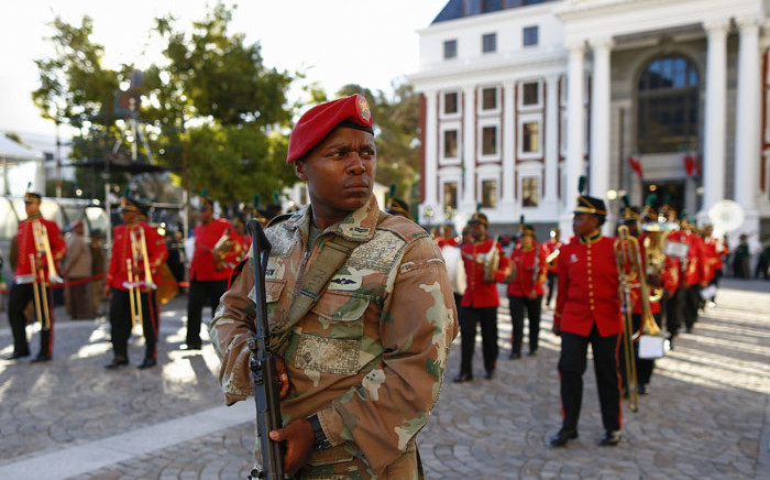 FILE: An SANDF soldier patrols in the streets near the Parliament ahead of the arrival of President Zuma for the opening ceremony of the State of the Nation Address (Sona) on 9 February 2017. Picture: AFP.