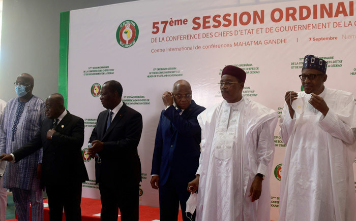 From (L-R): Presidents of Burkina Faso Roch Marc Christian Kaboré, President of Ghana Nana Akufo-Addo, President of Ivory Coast leader Alassane Ouattara, ECOWAS Commissioner Jean-Claude Kassi Brou, President of Niger Mahamadou Issoufou, and President of Nigeria Muhammadu Buhari of Nigeria pose for a group photo during an Economic Community of West African States (ECOWAS) leaders summit in Niamey on 7 September 2020. Picture: AFP