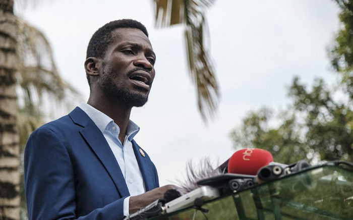 Musician-turned-politician Robert Kyagulanyi, also known as Bobi Wine, speaks during a press conference at his home in Magere, Uganda, on 15 January 2021. Picture: Sumy Sadruni/AFP.