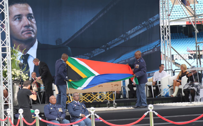 Joost van der Westhuizen's coffin draped in the national flag. Picture: Christa Eybers/EWN.
