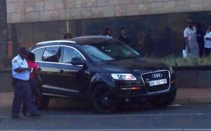 The Audi Q7 in which Sam Issa was shot and killed in Bedfordview on 12 October 2013. Picture: @MarkGander2/Twitter"