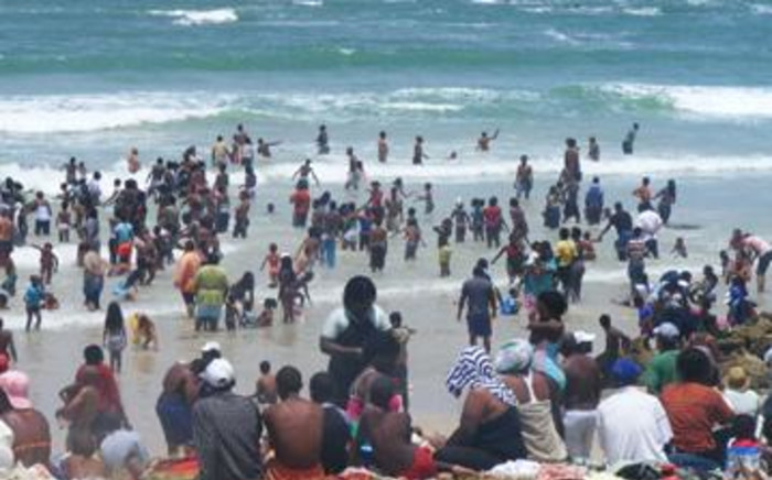 Bathers hit the surf at Mnandi Beach
