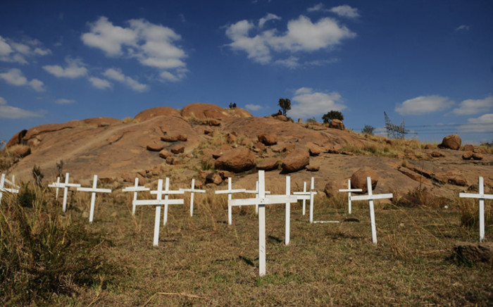 FILE:Crosses placed during 2012 for the 34 miners killed in the Marikana shooting. Picture: EPA.