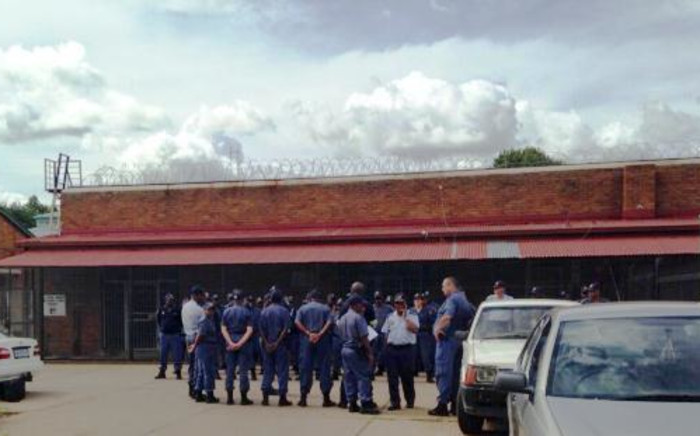 Police gather to plan their strategy against violet protesters in Zithobeni outside Bronkhorstspruit. Picture: Masego Rahlaga/EWN.