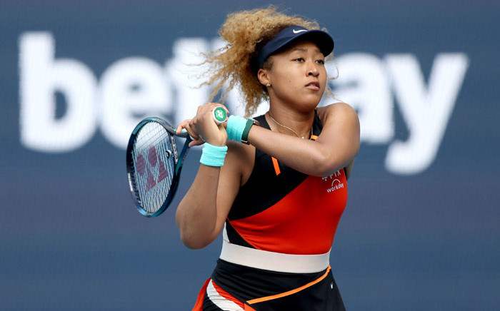 Naomi Osaka of Japan returns a shot to Belinda Bencic of Switzerland during the women's semifinals of the Miami Open at Hard Rock Stadium on 31 March 2022 in Miami Gardens, Florida. Picture: Matthew Stockman/Getty Images/AFP