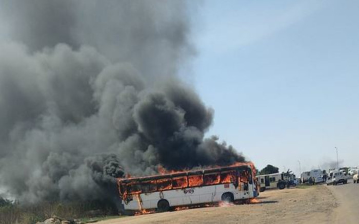 A bus was torched in violent protests near Rosslyn in Tshwane on 16 November 2021. Picture: Tshwane Emergency Services