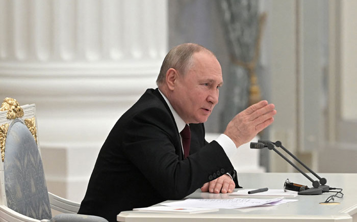 Russian President Vladimir Putin chairs a meeting with members of the Security Council in Moscow on 21 February 2022. Picture: Alexey NIKOLSKY/Sputnik/AFP