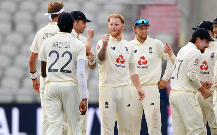 FILE: England's Ben Stokes (C) celebrates with teammates after taking the wicket of Pakistan's Shaheen Afridi on the third day of the first Test cricket match between England and Pakistan at Old Trafford in Manchester, north-west England on 7 August 2020. Picture: AFP