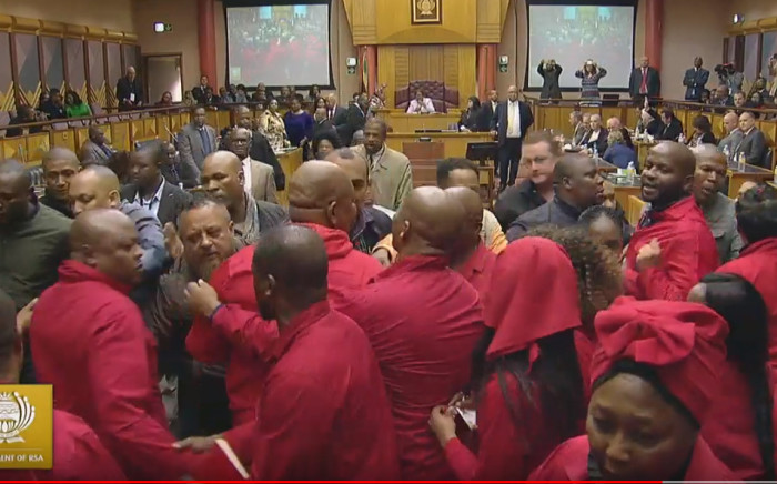 FILE: EFF MPs are thrown out during Pravin Gordhan's Public Enterprises budget vote. Picture: Parliament YouTube.