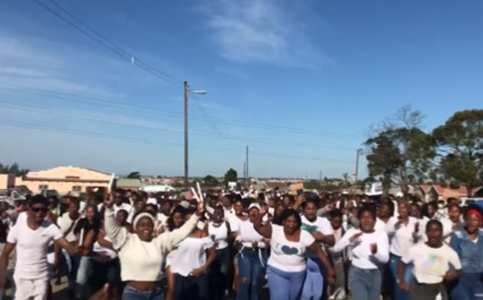 Youth from Scenery Park and neighboring communities in East London march for their 21 peers who died at Enyobeni Tavern and held a candle lighting ceremony on 29 June 2022. Picture: Screenshot