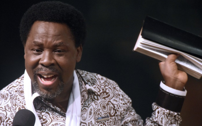 FILE: Nigerian pastor TB Joshua speaks during a New Year’s memorial service for the South African relatives of those killed in a building collapse at his Synagogue Church of All Nations on 31 December 2014. Picture: AFP.