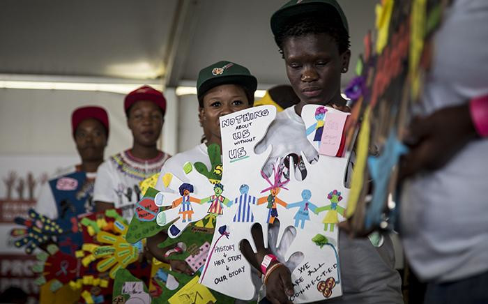 A group of young women present pieces of art during a World Aids Day event in Daveyton, east of Johannesburg, on 1 December 2016. Picture: Reinart Toerien/EWN