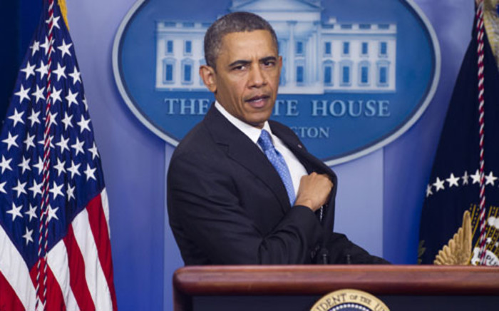 Barack Obama answers questions at a news conference. Picture: AFP.