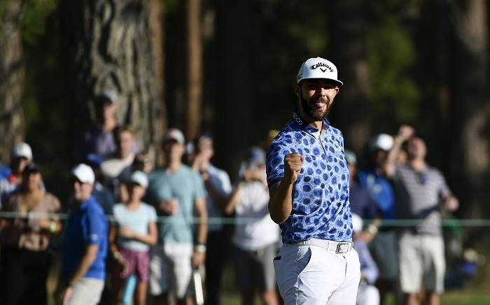 Erik van Rooyen of South Africa celebrates winning on the 18th green during the final round of the Barracuda Championship at Tahoe Mountain Club's Old Greenwood Golf Course on August 08, 2021 in Truckee, California. Alex Goodlett/Getty Images/AFP. 