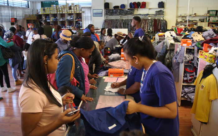 Parents get school uniforms for their children ahead of the start of the new Western Cape school year on 17 January, 2018. Picture: Bertram Malgas/EWN