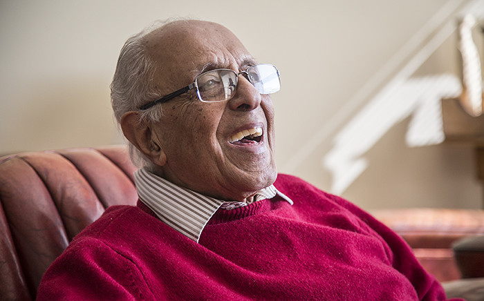 Former political prisoner and anti-apartheid activist Ahmed Kathrada laughs during a candid one-on-one interview with journalist Melanie Verwoerd. Picture: Reinart Toerien/EWN.