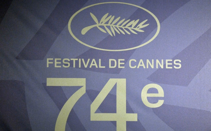 This photograph taken in Paris on June 3, 2021 shows the logo of the 74th Cannes Film Festival during a press conference, announcing the Official Selection of the 74th Cannes Film Festival to be held from July 6 until July 17, 2021. Picture: AFP.