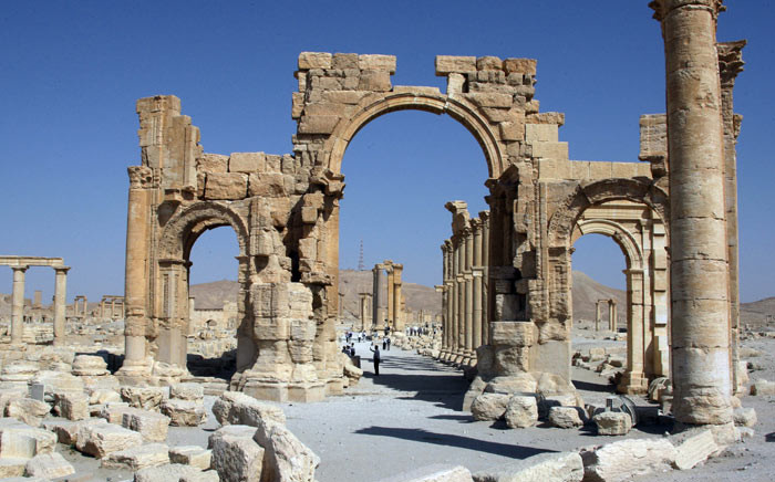 A file picture taken on 19 June 2010 shows the Arch of Triumph among the Roman ruins of Palmyra, 220km north-east of the Syrian capital Damascus. Picture: AFP.