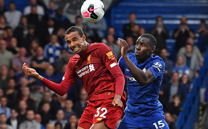 Liverpool defender Joel Matip (L) vies with Chelsea's defender Kurt Zouma (R) during the English Premier League football match between Chelsea and Liverpool at Stamford Bridge in London on 22 September 2019. Picture: AFP