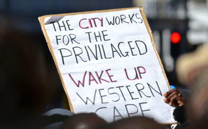 A protester holds up a placard during the ANCYL march through Cape Town on 27 August 2012. Picture: Aletta Gardner/EWN