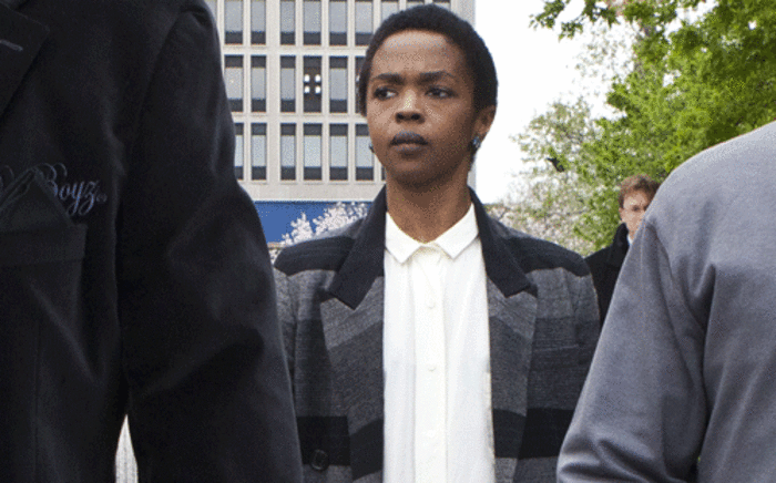 Singer Lauryn Hill is seen leaving court after the judge postpones her sentencing and gave her two weeks to pay back taxes 22 April 2013 in Newark, New Jersey. Picture: AFP