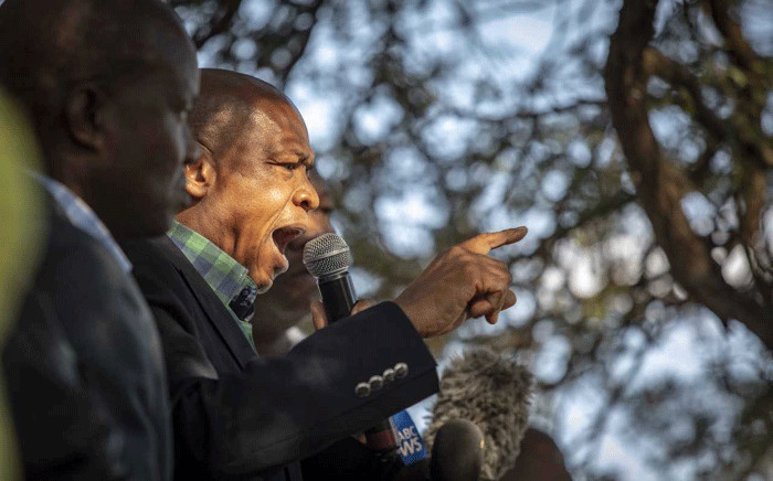 Supra Mahumapelo pictured addressing supporters underneath a thorn tree in Mahikeng before the ANC has placed him on precautionary leave, on 9 May 2018. Picture: Picture: Thomas Holder/EWN