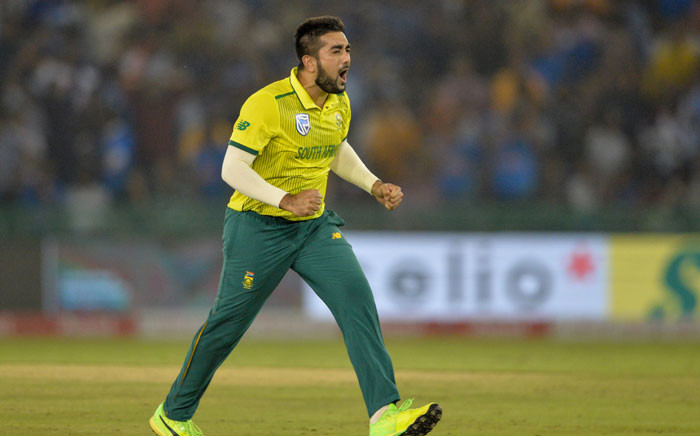 FILE: South Africa's Tabraiz Shamsi celebrates after he dismissed India's Shikhar Dhawan during the second Twenty20 international cricket match of a three-match series between India and South Africa at Punjab Cricket Association Stadium in Mohali on 18 September 2019. Picture: AFP