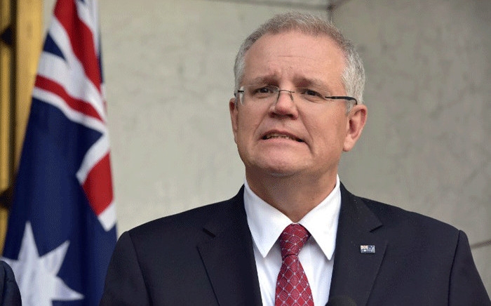 Australia's Treasurer Scott Morrison attends a press conference in Parliament House in Canberra on 22 August, 2018. Picture: AFP.