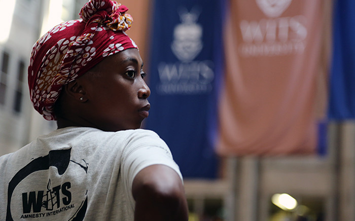 FILE: A Wits student stands inside Senate House on campus on 19 October 2015 during protests over a proposed fee increase for the 2016 year. Picture: Reinart Toerien/EWN.