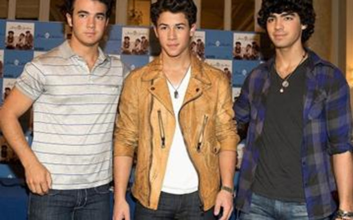 (L-R) Kevin Jonas, Nick Jonas and Joe Jonas present Jonas Brothers new album 'Lines, Vines & Trying Times', at the Ritz Hotel on 13 June 2009 in Madrid, Spain. Picture: Getty Images