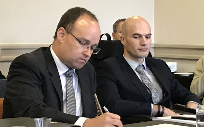 Attorney Martus de Wet (left) and Dr Jacques De Vos (right) at the Health Professions Council fo South Africa's hearing on 27 August 2019. Picture: Kevin Brandt/EWN.