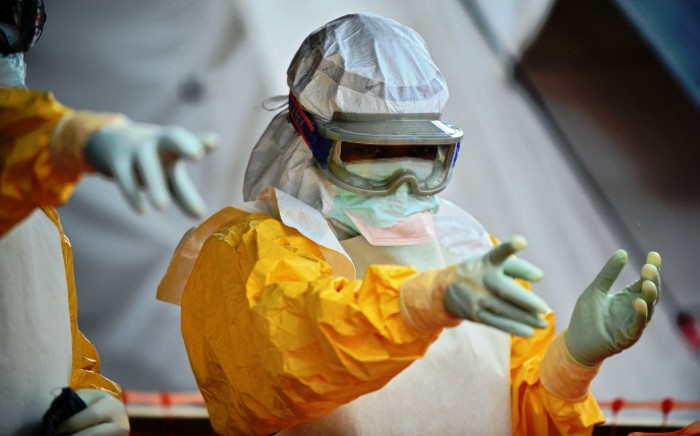 An MSF medical worker, wearing protective clothing at an MSF Ebola treatment facility in Kailahun, on 15 August 2014. Picture: AFP.