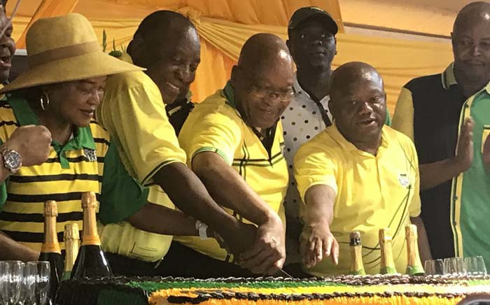 







Speaker of the National Assembly Baleka Mbete, President Cyril Ramaphosa, former President Jacob Zuma, and ANC KZN chairperson Sihle Zikalal cut the cake at the ANC's 107 birthday celebrations. Picture: EWN 

