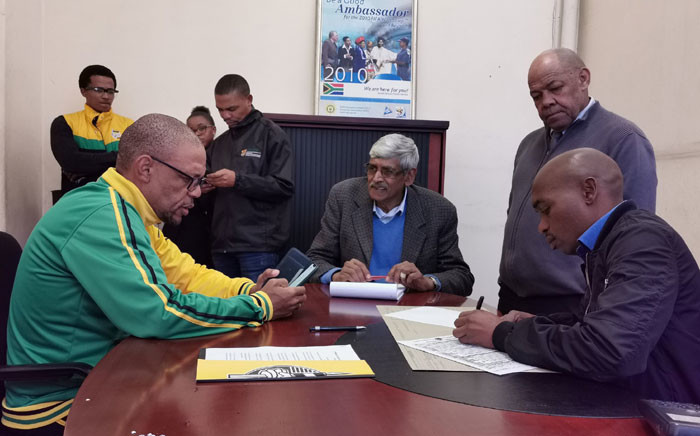 ANC national spokesperson Pule Mabe, together with the party's legal advisor Krish Naidoo, lays a criminal complaint against Steve Hofmeyr with the South African Police Service, on 24 June 2019. Picture: @MYANC/Twitter