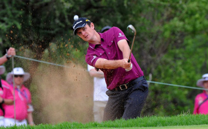 Justin Rose of England plays a shot on the 14th hole, on day 3 of the 4 day 2012 Nedbank Golf Challenge in Sun City on 1 December, 2012.  Picture: AFP/ Alexander Joe