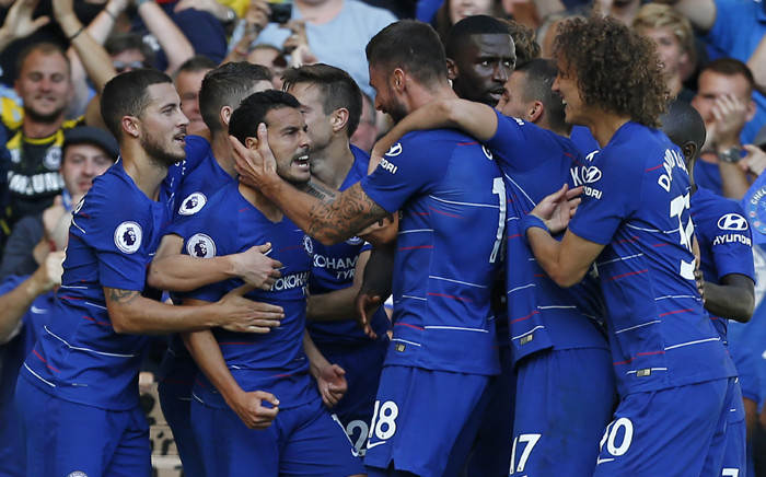 Chelsea's Spanish midfielder Pedro (3rd L) celebrates with teammates after scoring the opening goal of the English Premier League football match between Chelsea and Bournemouth at Stamford Bridge in London on 1 September 2018. Picture: AFP.