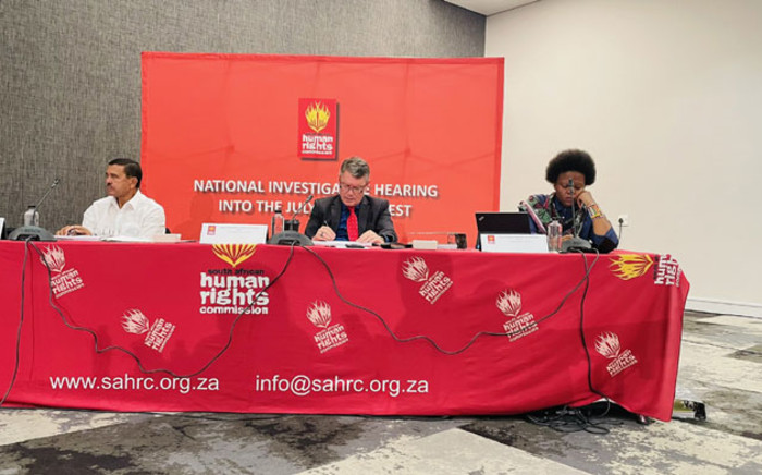 FILE: SAHRC commissioners Chris Nissen (left), Andre Gaum (centre) and Philile Ntuli (right) listen to evidence during hearings into the 2021 July unrest. Picture: @SAHRCommission/Twitter
