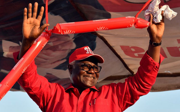 Sierra Leone's outgoing President Ernest Bai Koroma waves to supporters during a campaign rally for his party's presidential candidate on March 3, 2018, in Kambia, ahead of the country's general election. Sierra Leone goes to the polls on March 7 for a general election that will select a new president, parliament and local councils. Picture: AFP