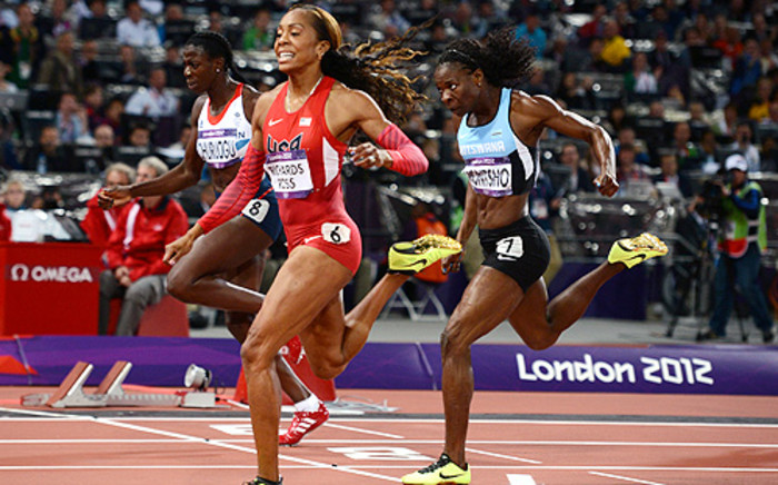 USA's Sanya Richards-Ross crosses the finish line to win the women's 400m finals at the London 2012 Olympic Games. Picture: AFP