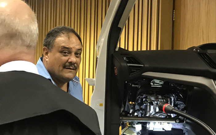 Investigator Hendrik McLeod pictured at the stripped-down replica of a Ford Kuga at the Western Cape High Court on 27 May 2019 for the inquest into Reshall Jimmy's death. Picture: Kevin Brandt/EWN