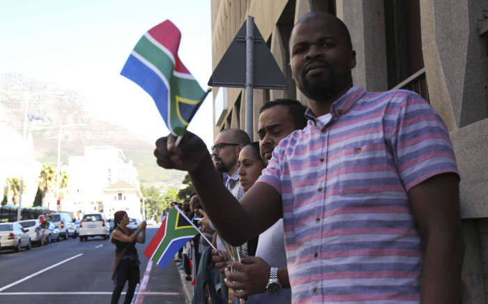 Protesters form a human chain outside Parliament in order to protest against President Jacob Zuma. Picture: Cindy Archillies/EWN.